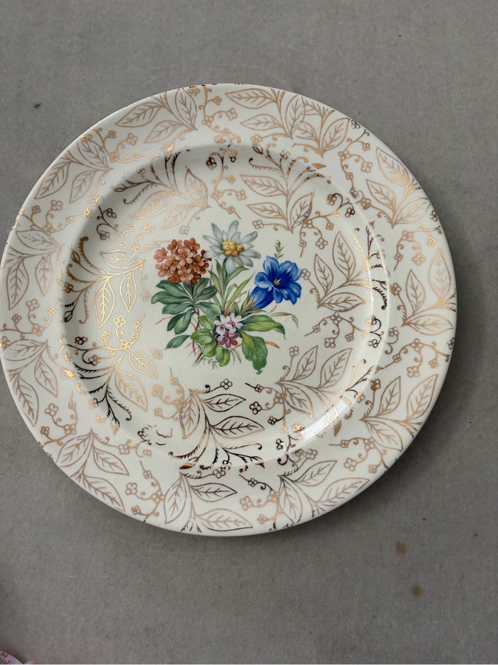 White Porcelain Dinner Plate with Gold Leaf and Floral Center